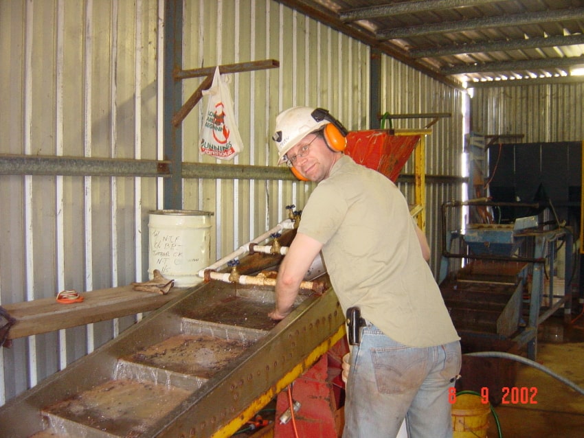 Steven Cooper operating grease table at Timber Creak in September 2002.